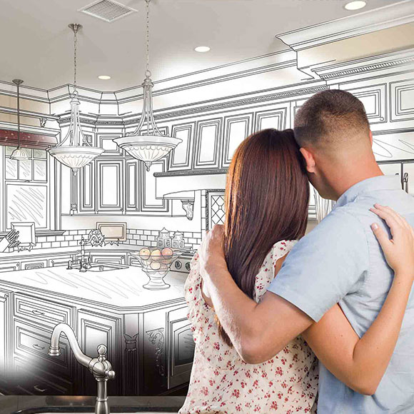 home loan - couple looking at kitchen design depicting refinance for home improvement